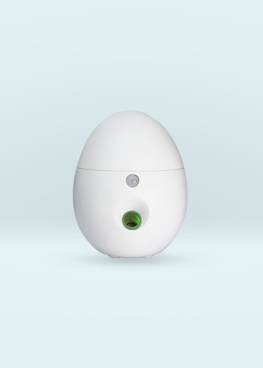 Airburst Nebulizing Waterless Diffuser in white with motion sensor for cordless essential oil diffusion up to 36 hours.