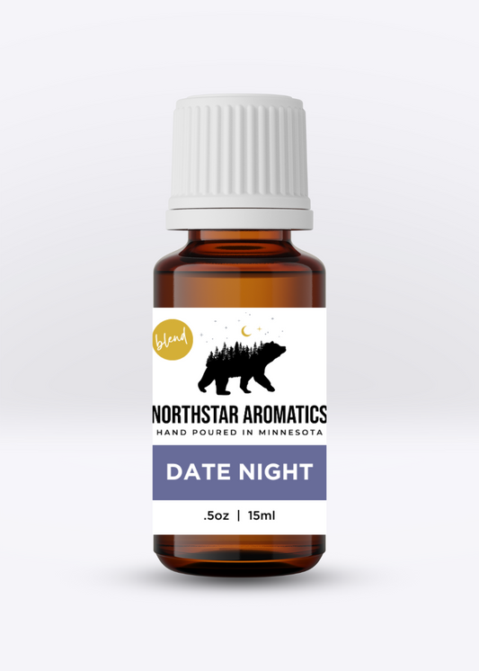 Date Night Blend essential oil bottle by Northstar Aromatics, 15ml amber glass with white cap and label.