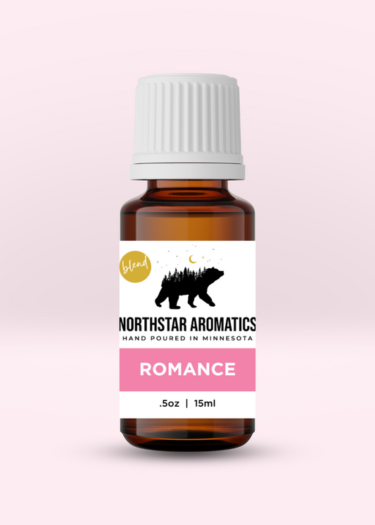 Romance Blend essential oil bottle by Northstar Aromatics with a pink label, 15ml amber glass bottle.