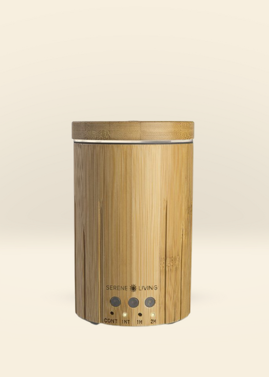 Bamboo Diffuser ultrasonic essential oil diffuser made from sustainable bamboo with timer and intermittent settings.