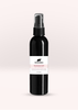 Black plastic spray bottle of rosewater hydrosol by Northstar Aromatics on soft light pink background