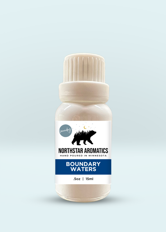 Boundary Waters Laundry Oil with sweet honey almond and vanilla bean scent in 15ml Northstar Aromatics bottle.