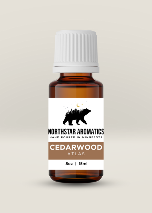 Cedarwood Atlas grounding and spiritual oil in amber glass bottle for meditation and mental relaxation.