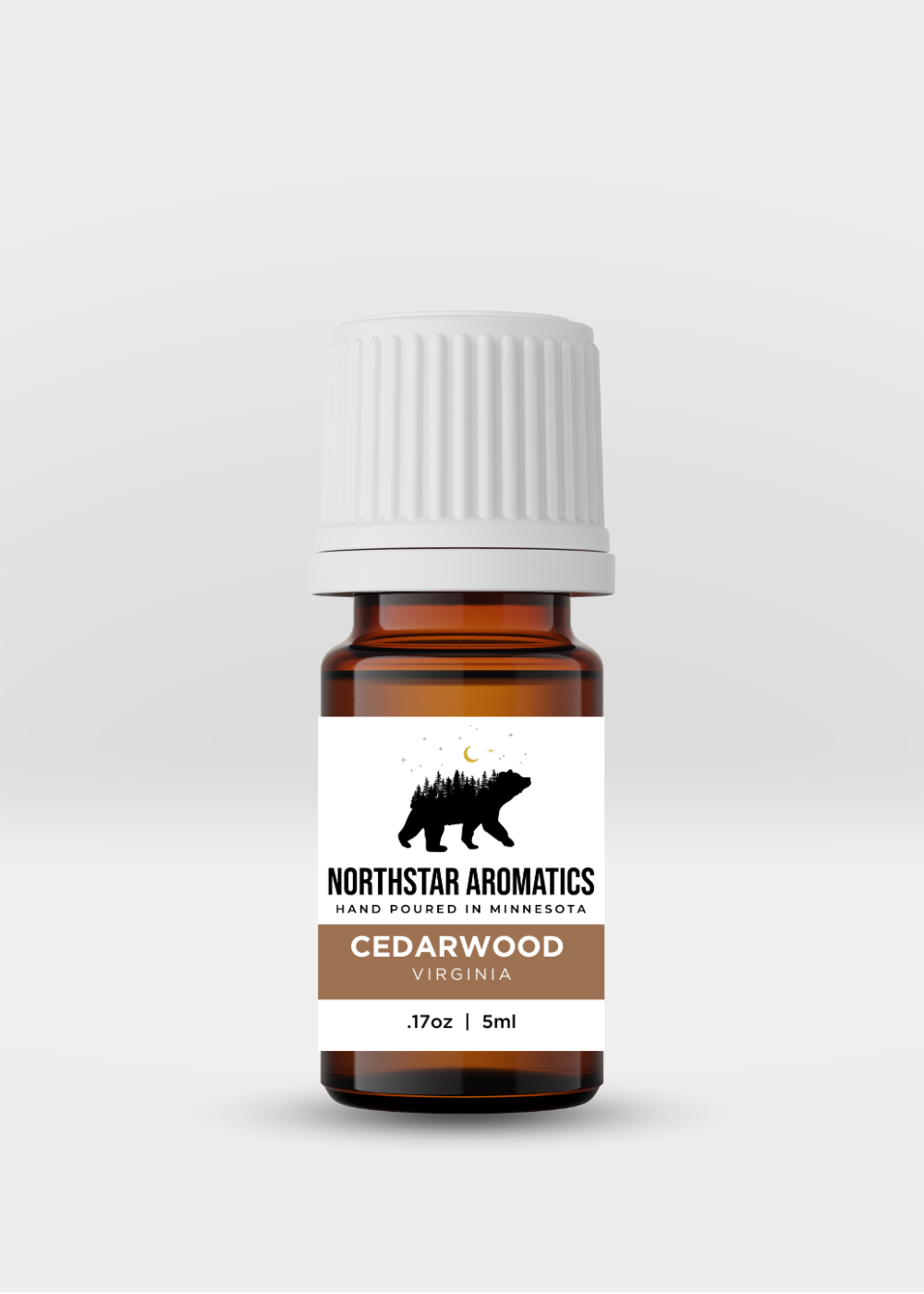 Amber bottle of Cedarwood Virginia essential oil by Northstar Aromatics with white label and cap, 5ml size.
