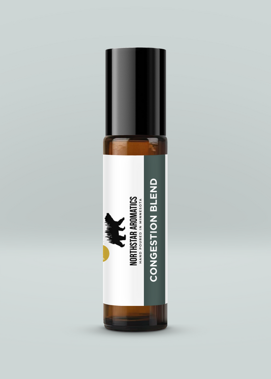 Congestion Blend Roll-On in amber glass bottle with black cap for soothing respiratory support and congestion relief.