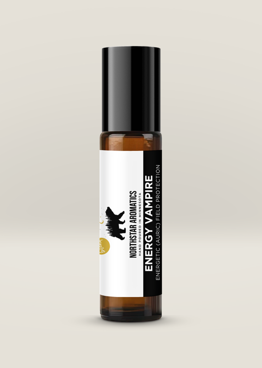 Amber roll-on bottle labeled Energy Vampire with black cap for energetic field protection against toxic energy
