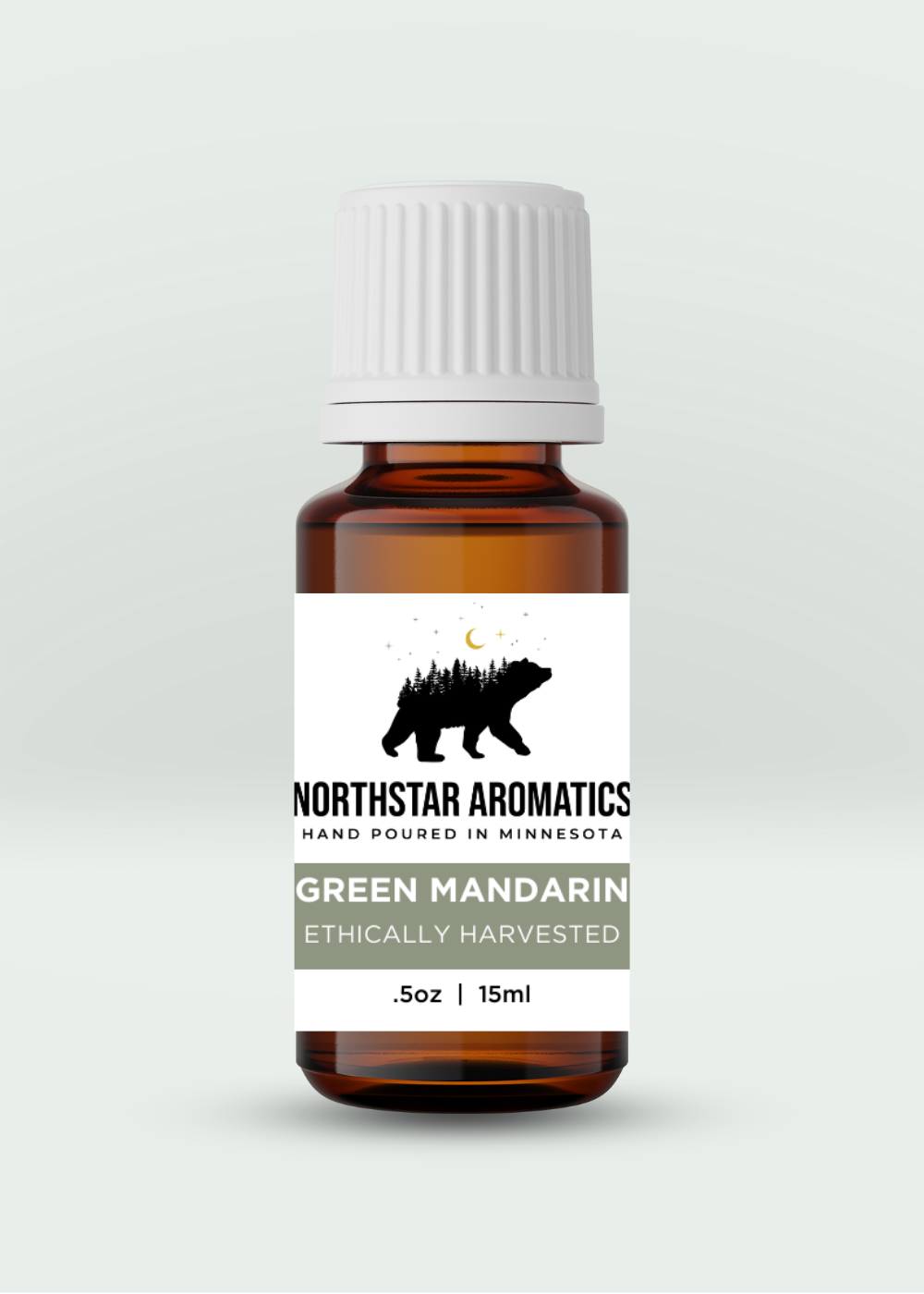 Green Mandarin essential oil bottle by Northstar Aromatics with a white cap and minimalist label design.