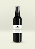 Black plastic spray bottle of organic White Sage hydrosol by Northstar Aromatics on light beige background