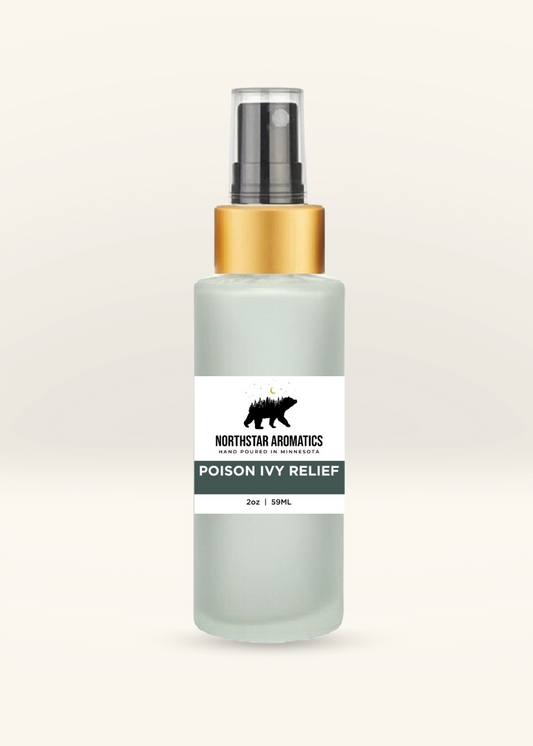 Poison Ivy Relief Spray in frosted glass bottle with gold spray top for soothing poison ivy and skin irritation.