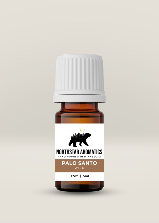 Palo Santo Wild aromatic oil bottle by Northstar Aromatics for stress relief and spiritual clearing.