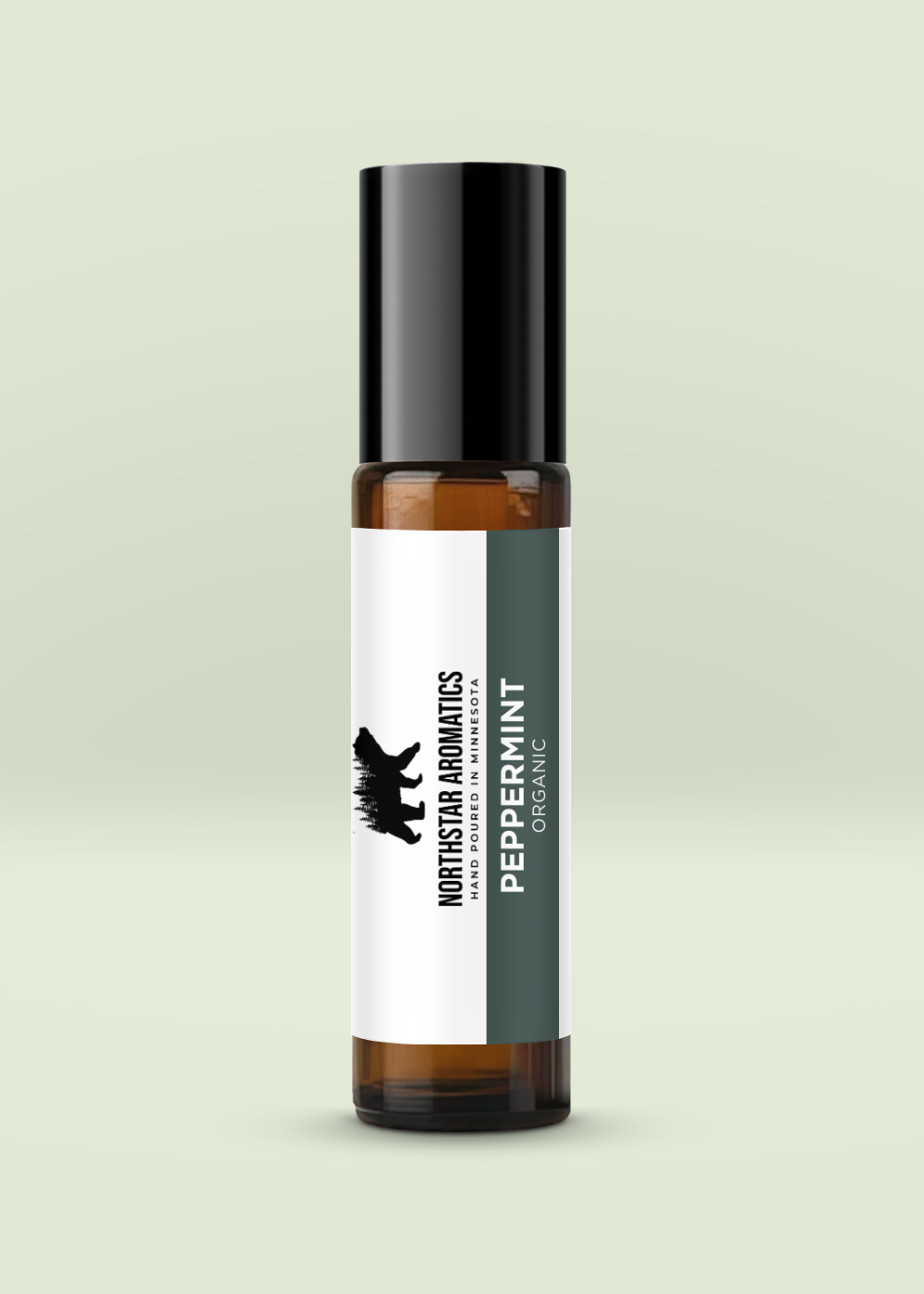Peppermint Roll-On bottle with black cap and label showing Northstar Aromatics organic peppermint essential oil.