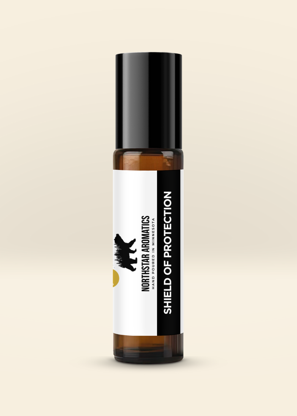 Shield of Protection Roll-On bottle with black cap and white label from Northstar Aromatics on beige background