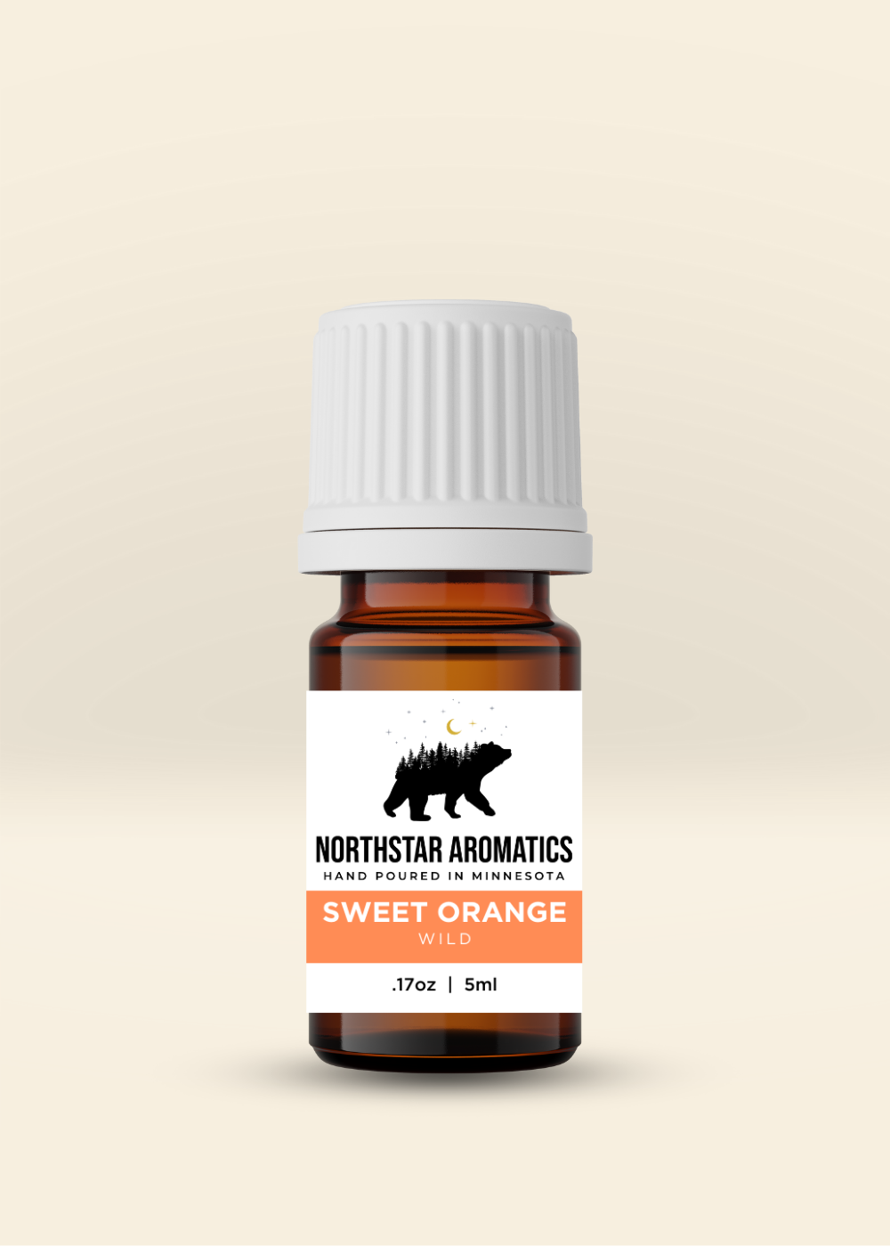 Amber bottle of Sweet Orange essential oil by Northstar Aromatics with white cap and label against beige background.