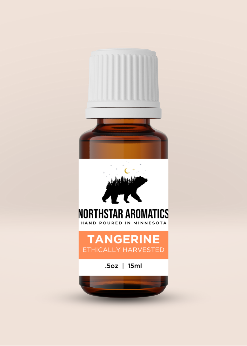 Amber glass bottle of Tangerine essential oil with white cap, ethically harvested, hand poured in Minnesota for aromatherapy use