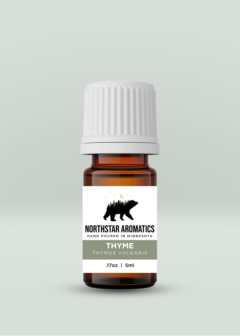 Thyme Thymol essential oil bottle with white cap and Northstar Aromatics label on light background