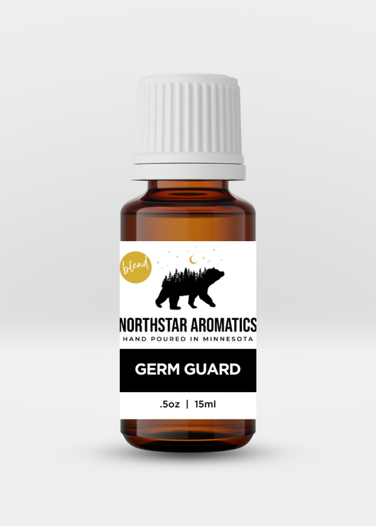 Amber glass bottle of Germ Guard essential oil blend by Northstar Aromatics with white cap and label