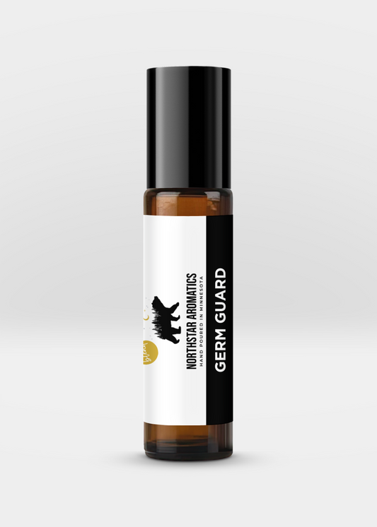 Amber glass roll-on bottle labeled Germ Guard with black cap, designed for natural daily wellness support