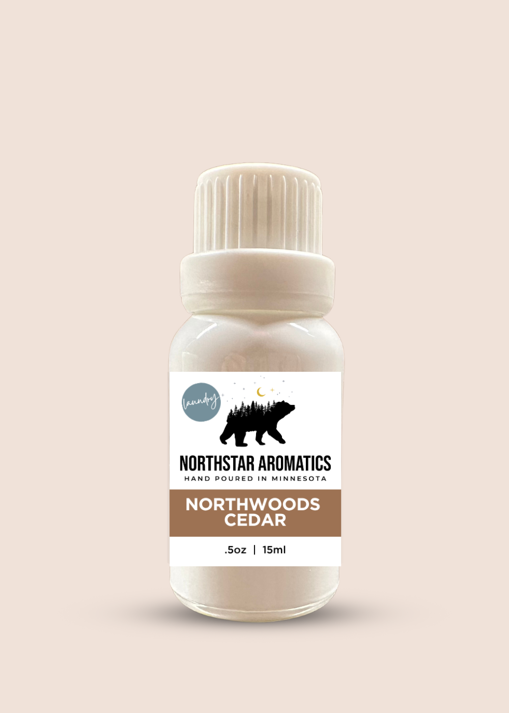 Northwoods Cedar Laundry Oil by Northstar Aromatics, warm woods leather dryer ball oil for cozy laundry.